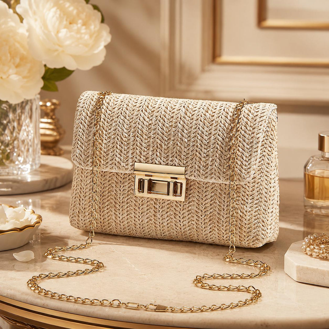 Woven Boho-style crossbody shoulder bag with chain.
